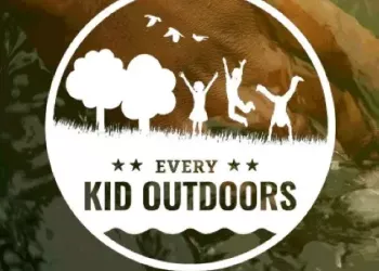 Every Kid Outdoors white logo on brown-green background